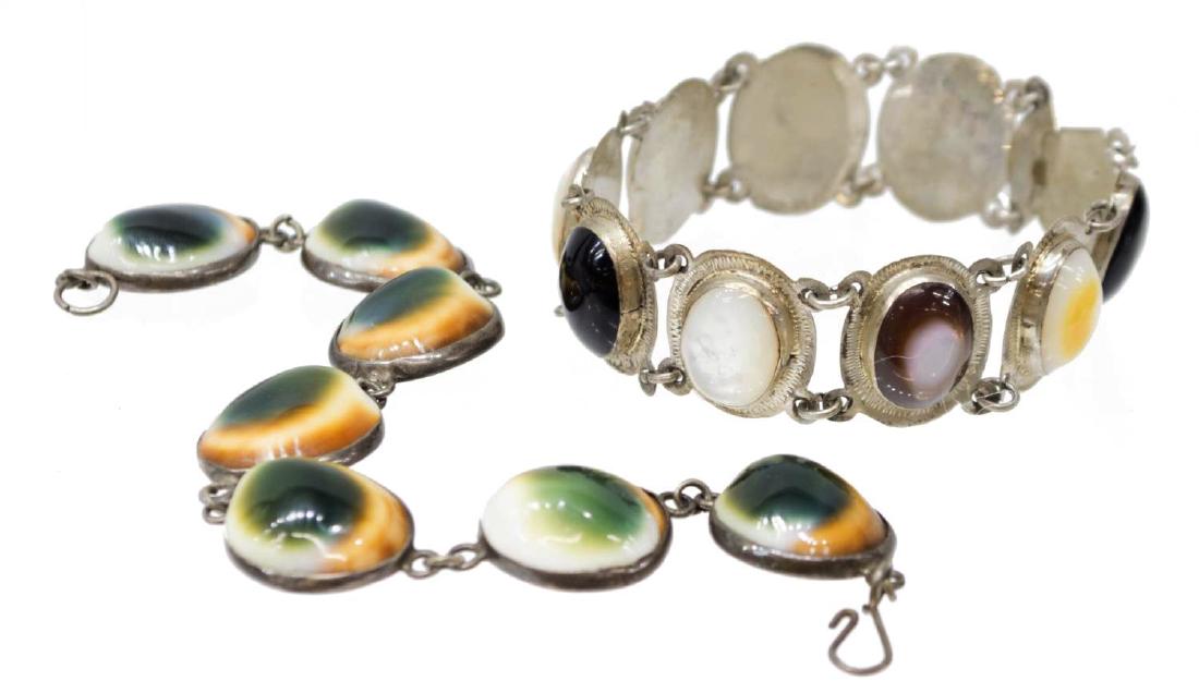 2) LADIES ESTATE SILVER STONE GLASS LINK BRACELETS: (lot of 2) Ladies estate silver and stone link bracelets, comprising: (1) mother-of-pearl and onyx bracelet, each bezel set with ring links, 6.5"l; (1) green, white, and yellow glass bracelet, bezel s