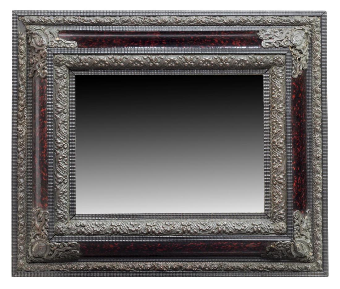 NAPOLEON III FAUX TORTOISE SHELL BEVELED MIRROR: Continental Napoleon III faux tortoise shell beveled wall mirror, having embossed foliate metal corners and trim, around rectangular beveled glass plate, traces of gilt visible on metal, with loss, cr