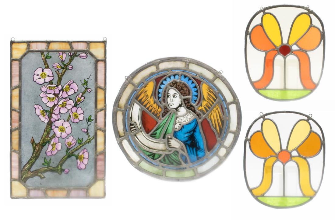 (4) ART NOUVEAU & RELIGIOUS STAINED GLASS PANELS: (lot of 4) Italian leaded stained glass panels, c. 1900's, of various shapes and styles, including: (2) Art Nouveau floral motif oval shaped stained glass, 10"h, 8"w; (1) circular stained glass showin