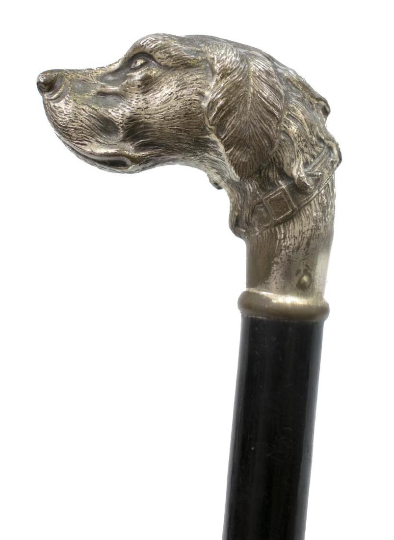 ITALIAN SILVERPLATE DOG HEAD WALKING CANE, 19TH C.: Italian silverplate and wood walking cane, 19th c., having silver plated dog head form handle, over black painted wood cane, some loss to silverplate, 35.5"h, 0.75lbs Start Price: $80.00