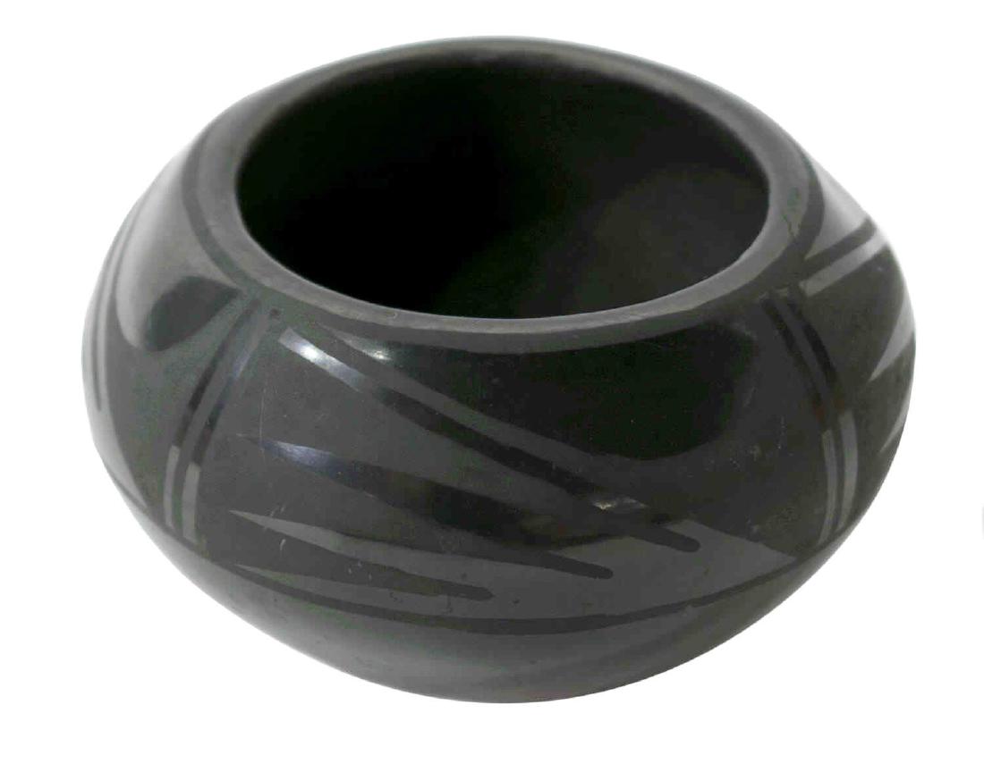 MARIE & SANTANA MARTINEZ BLACK ON BLACK BOWL 2.75": San Ildefonso Pueblo, New Mexico, black decoration on black pottery bowl, signed at under side Marie / Santana (Maria Martinez, 1887-1980), Santana Martinez (wife of Adam, Marie's son, 1909-2002), 2.7