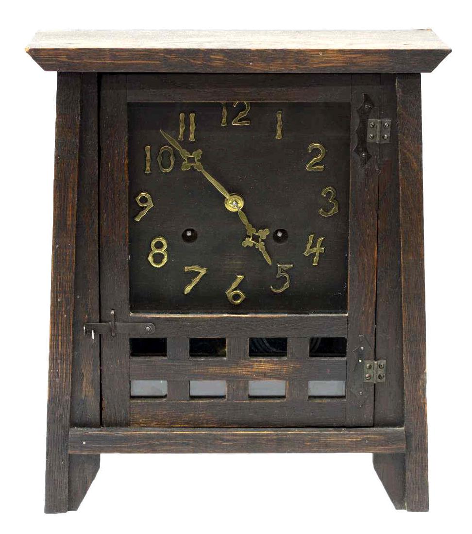 NEW HAVEN ARTS & CRAFTS MANTLE CLOCK: Oak cased Mission style mantle clock, New Haven Clock Company, time and strike movement with brass Arabic numerals, includes key and pendulum, makers tag at back, time operating, strike over wound, 13