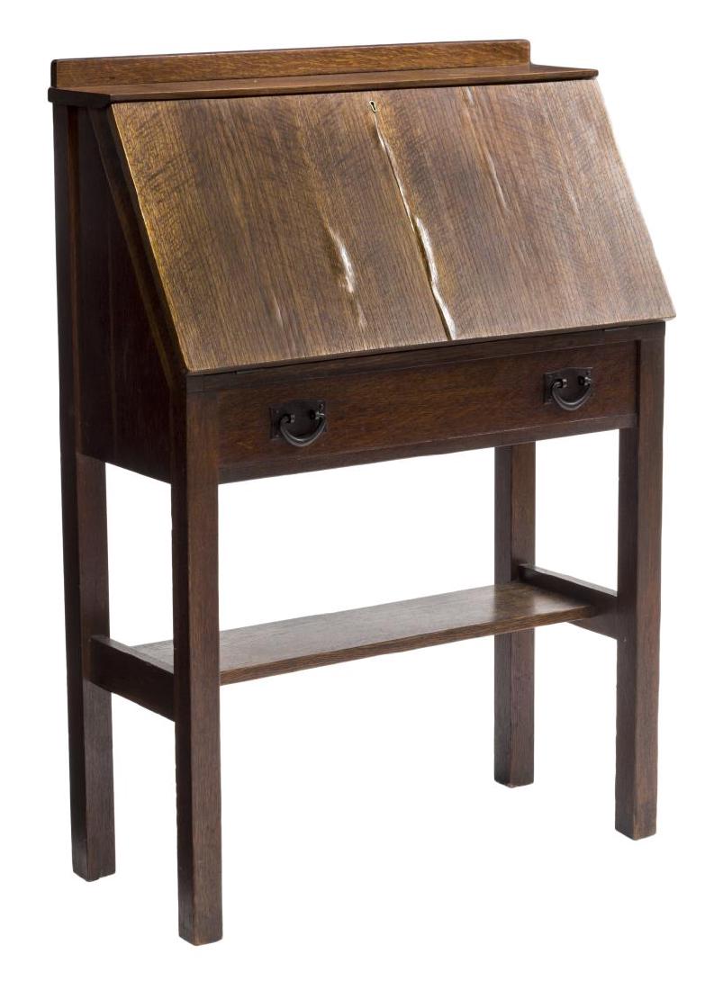 GUSTAV STICKLEY ARTS & CRAFTS OAK FALL FRONT DESK: Arts and Crafts oak fall front desk, Gustav Stickley, 1905-1912, the rectangular top over fall front door, opening to fitted interior, above single drawer with patinated pulls, rising on squared legs 