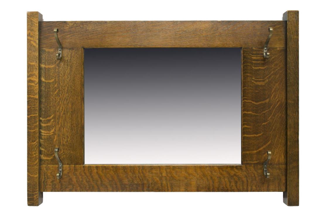 QUARTERSAWN OAK MIRRORED COAT RACK: Quartersawn oak framed beveled mirror with four scrolled coat hooks, 28.75"h, 40.25"w Start Price: $80.00