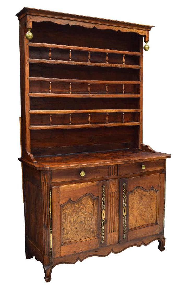 FRENCH LOUIS XV 18TH C. VAISSELIER: French Louis XV vaisselier, 18th c., a stepped cornice over three display shelves faced with spindle supported rails, the lower cabinet with a shaped work surface, two frieze drawers above two burl pa