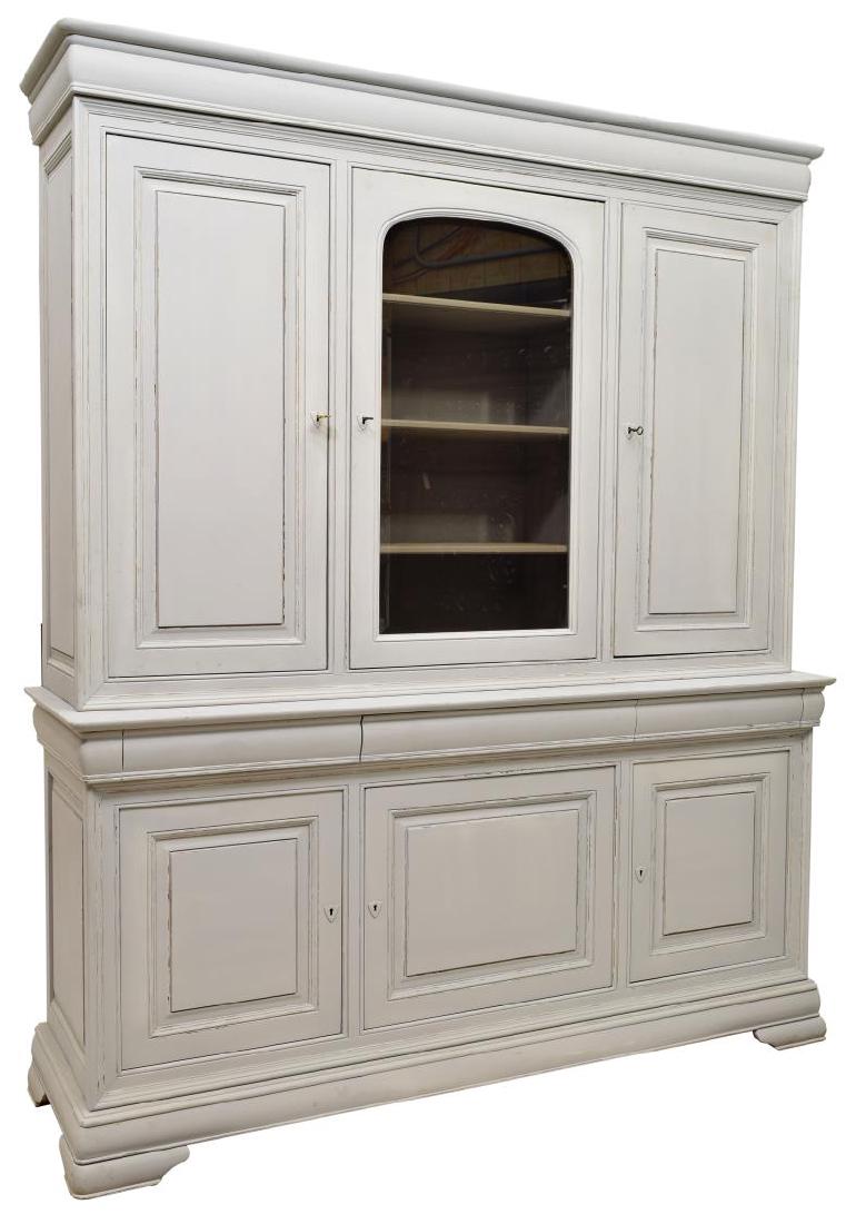 ITALIAN PAINTED BOOKCASE WITH GLAZED DOOR: Italian bookcase in two-parts, 20th c., the structure in powder blue paint having a simple cornice above central glazed door and two paneled doors, the base fitted with three drawers, one with lift to