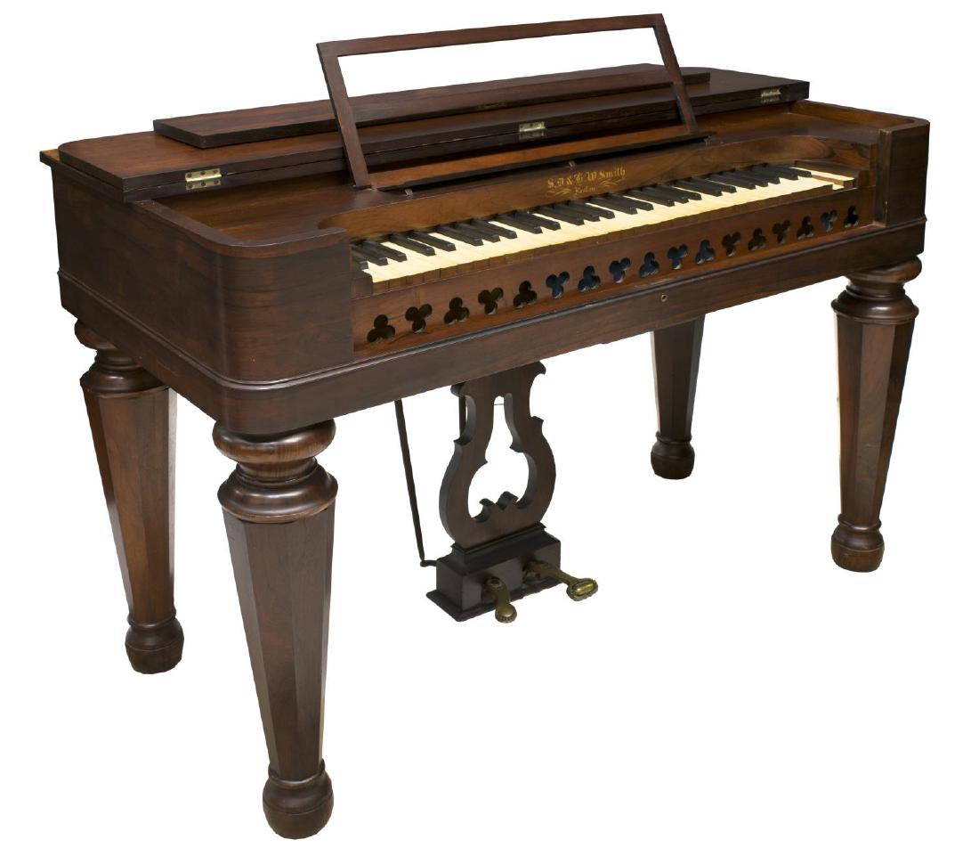 ROSEWOOD CASED SD & HW SMITH PUMP ORGAN, 1860'S: Rosewood cased pump melodian / organ by SD & HW Smith, Boston, c.1860, the hinged top opening to the 61 place key board, all rising on tapered octagonal supports with turned feet, 32.5"h, 47"w, 23"d S