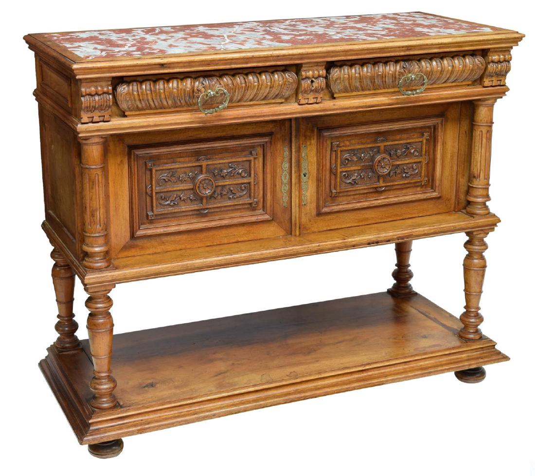 FRENCH HENRI II STYLE MARBLE TOP SIDEBOARD 19TH C: French Henri II Renaissance Revival marble top sideboard, 19th c., the top set with a variegated red marble above two drawers and foliate paneled doors, flanked by grooved columns, over a lower shelf 