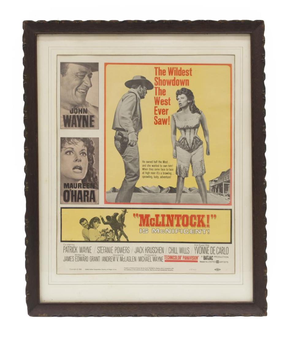 FRAMED MOVIE POSTER, McLINTOCK, JOHN WAYNE: Framed movie poster, "McLintock", starring John Wayne and Maureen O'Hara. copyright 1963, sight: 16.1/8"h, 13.1/8"w, overall with frame: 21.75"h, 17.75"w, 4lbs Start Price: $60.00