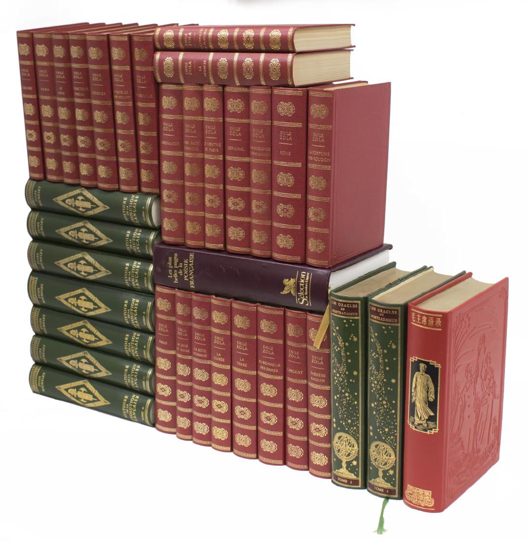(35) COLLECTION LEATHER BOUND LIBRARY BOOKS: (lot of 35) Collection of leather and vinyl bound library books, in green and red, some embossed, all with gilt lettering to spines, highlights include (two) "Les Oracles de Nostradamus", and (twenty