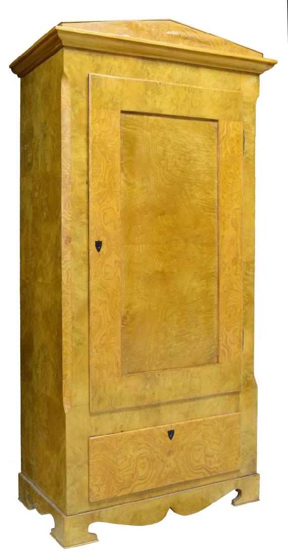 DANISH BIEDERMEIER STYLE BIRCHWOOD ARMOIRE: Danish Biedermeier style Birchwood armoire, the triangle architectural motif crest over rectangular case with door above drawer, rising on pedestal bracket feet base, 76"h, 38.25"w, 20.75"d Start Pric