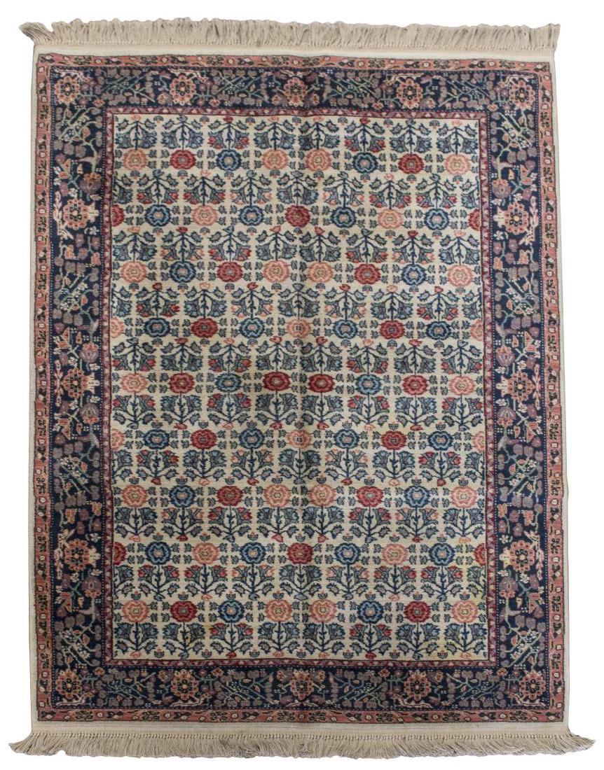 KARASTAN HAND TIED WOOL RUG, APPROX 5'9" X 8'8": Karastan hand tied wool rug, in pinks, reds, navy, blues and beiges, "Feraghan Florals" from the Stately Homes Collection, some stains, approx 5'9" x 8'8" Start Price: $80.00