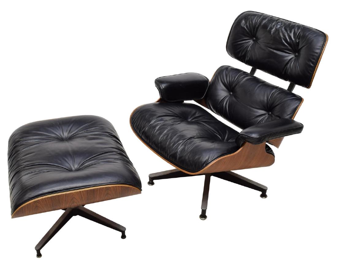 (2) EAMES HERMAN MILLER BLACK LOUNGE & OTTOMAN: (lot of 2) Black leather rosewood framed lounge chair and ottoman, by Charles and Ray Eames for Herman Miller, both retaining multiple Herman Miller tags at undersides: (1) chair with tufted buttoned 