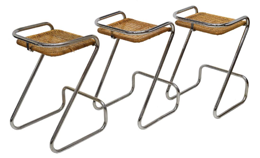 (3)ITALIAN MID-CENTURY MODERN WICKER BAR Z CHAIRS: (lot of 3) Italian mid-century modern wicker "Z" bar stools, c. 1960's, woven wicker seats in chromed steel tubular frame base with low back rail and foot rest, wear, loss and breaks to wicker, 28"h, 