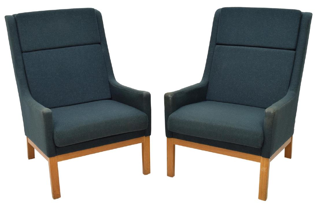 (2) DANISH MID-CENTURY MODERN ARM CHAIRS, LARSEN: (pair) Danish mid-century modern upholstered chairs, c 1960, design by Kai Lyngfeldt Larsen, a dark green fabric with three removable seat and back cushions, rising on squared legs, retaining designer