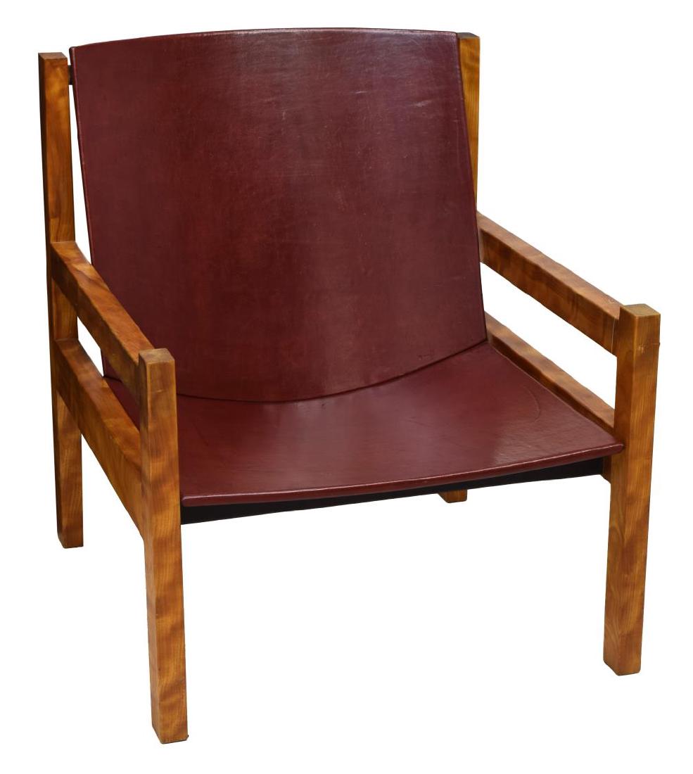 MID-CENTURY MODERN MAPLE & LEATHER ARM CHAIR: Mid-century modern maple framed arm chair, 1960's, upholstered in red and black leather, rising on squared supports, 28"h, 25"w, 26"d Start Price: $150.00