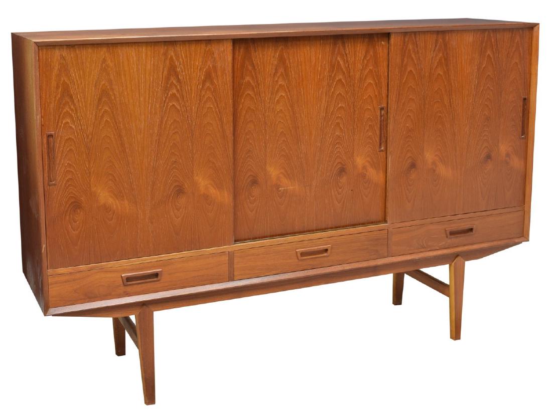 DANISH MID-CENTURY MODERN TEAKWOOD SIDEBOARD: Danish mid-century modern teakwood sideboard, c. 1950's, the rectangular case fitted with three sliding doors, concealing shelving and shallow drawers, one side having mirrored interior, over three dr