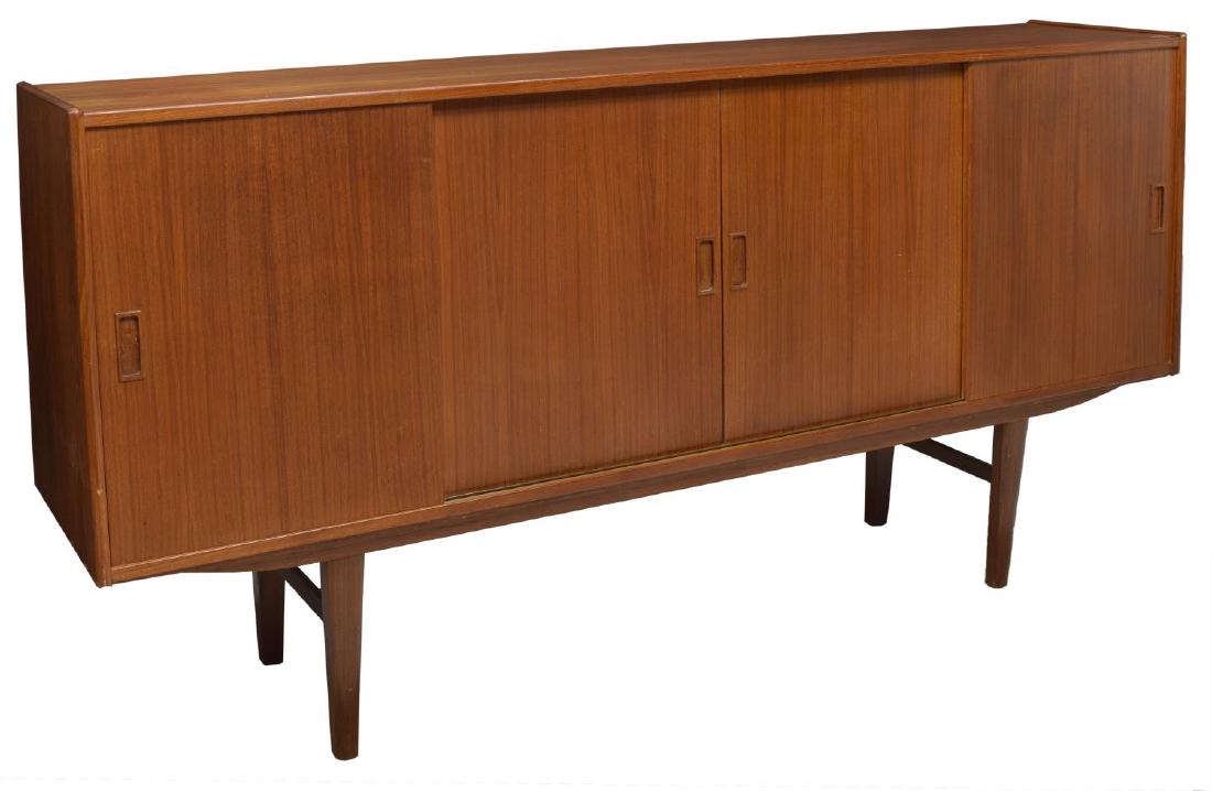 DANISH MID-CENTURY MODERN TEAKWOOD SIDEBOARD: Danish mid-century modern teakwood sideboard, c. 1950's, the rectangular case fitted with four sliding doors concealing shelving and central mirrored back interior with drawers, rising on joined taper