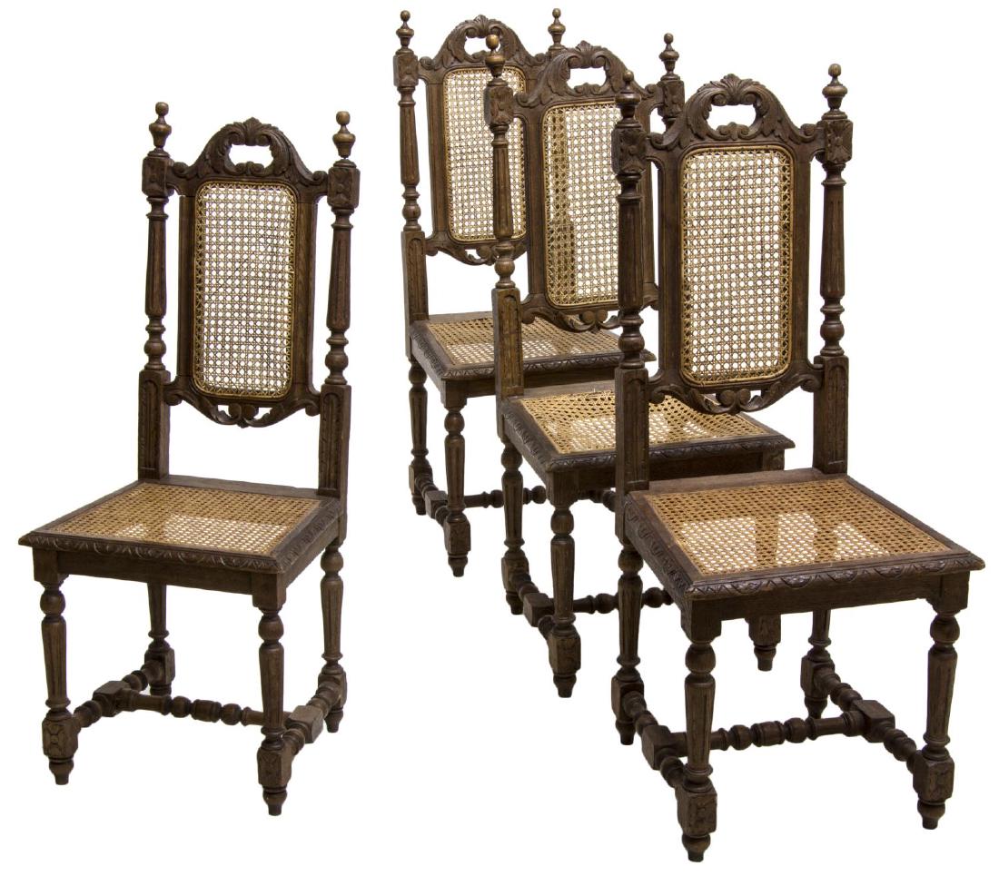 (4) ROCAILLE CARVED OAK & CANED DINING CHAIRS: (lot of 4) Rocaille carved oak and caned dining chairs, the turned stiles centering rocaille pierced carved frame with caned back over caned seat, rising on joined arrow feet, wood glue visible throug