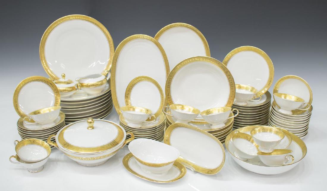 (74) EBERTHAL PARCEL GILT PORCELAIN DINNER SERVICE: (set of 74) Eberthal parcel gilt porcelain dinner service, each having encrusted gilt rim showing a surround of frolicking nymphs and wildlife, comprising: (10) dinner plates, 10.5"diam; (24) side pla
