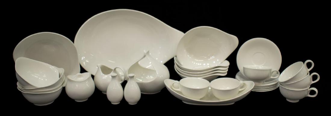 (29)MID-CENTURY EVA ZEISEL HALLCRAFT DINNER SET: (set of 29) Mid-century porcelain dinnerware with white design by Eva Zeisel (Hungarian-born American, b. 1906-2011) for Hallcraft (contemporary division of Hall pottery), comprisng: (5) lug handled s