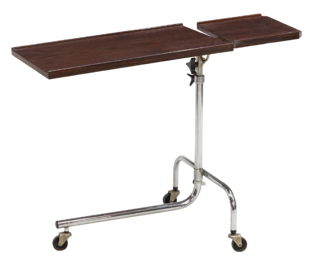DANISH MID-CENTURY MODERN ROSEWOOD READING TABLE: Danish mid-century modern rosewood adjustable height tray table-reading table with two platforms by HMN rising from 25" to 36", the chrome steel frame on castors, small wood loss at one corner, 35"w, 