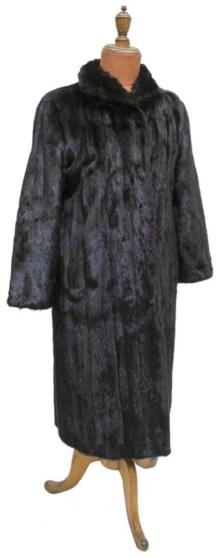 LADIES JOHN TAUBEN RANCH MINK COAT: Ladies John Tauben (Dallas, Houston, Tulsa) Ranch mink coat, retaining hooks for closure, lacking all but one loop, interior liner loose on one side, approx 19" (shoulder to shoulder), 22.5"l (shoulde