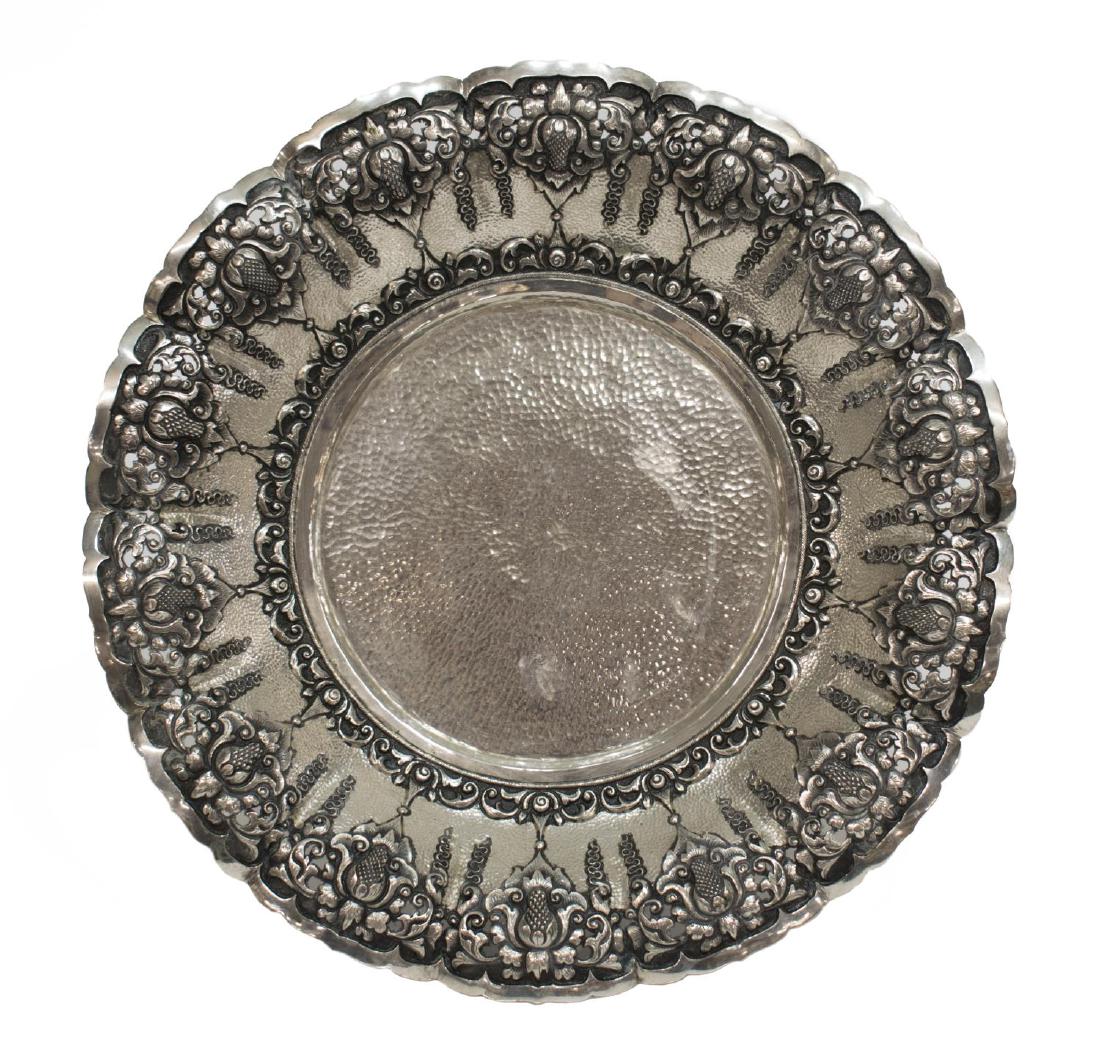 INDONESIAN 'YOGYA' 800 SILVER CENTER BOWL: Indonesian 800 'Yogya' silver center bowl, pierced borders showing repousse floral buds, textured walls and well, on three ball feet, marked ZR800, 2.25"h, 11.25"diam, 17.03ozt Start Price: $150.00