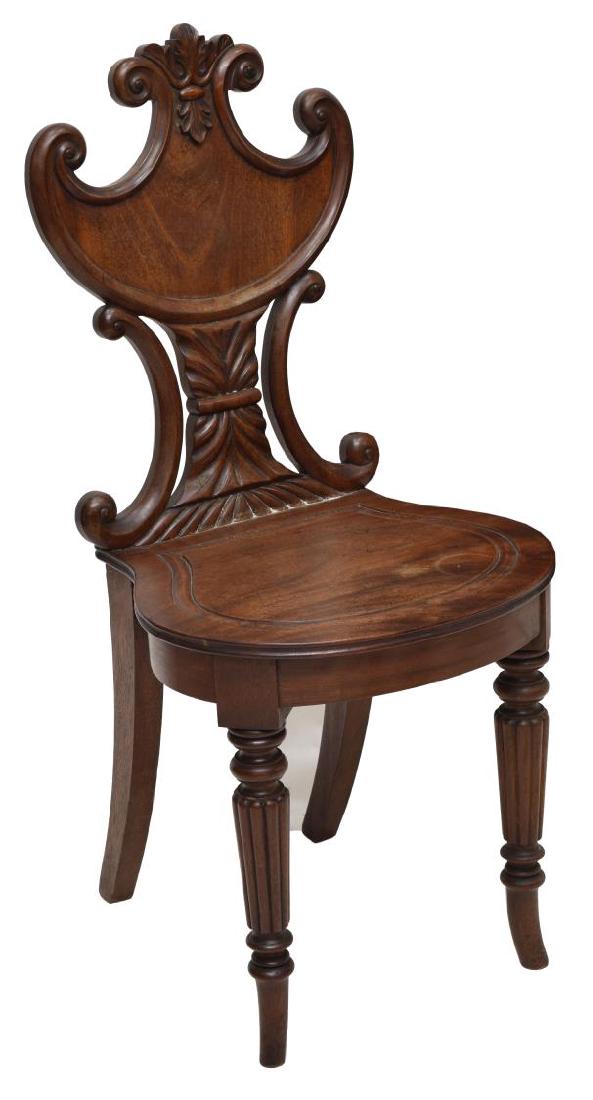 GEORGE IV MAHOGANY HALL CHAIR MANNER OF GILLOWS: George IV period mahogany hall chair, c. 1830, England, in the manner of Gillows of Lancaster, carved and waisted back, bow-fronted seat with moulded circlet, turned and reeded fore-legs, curved rear 