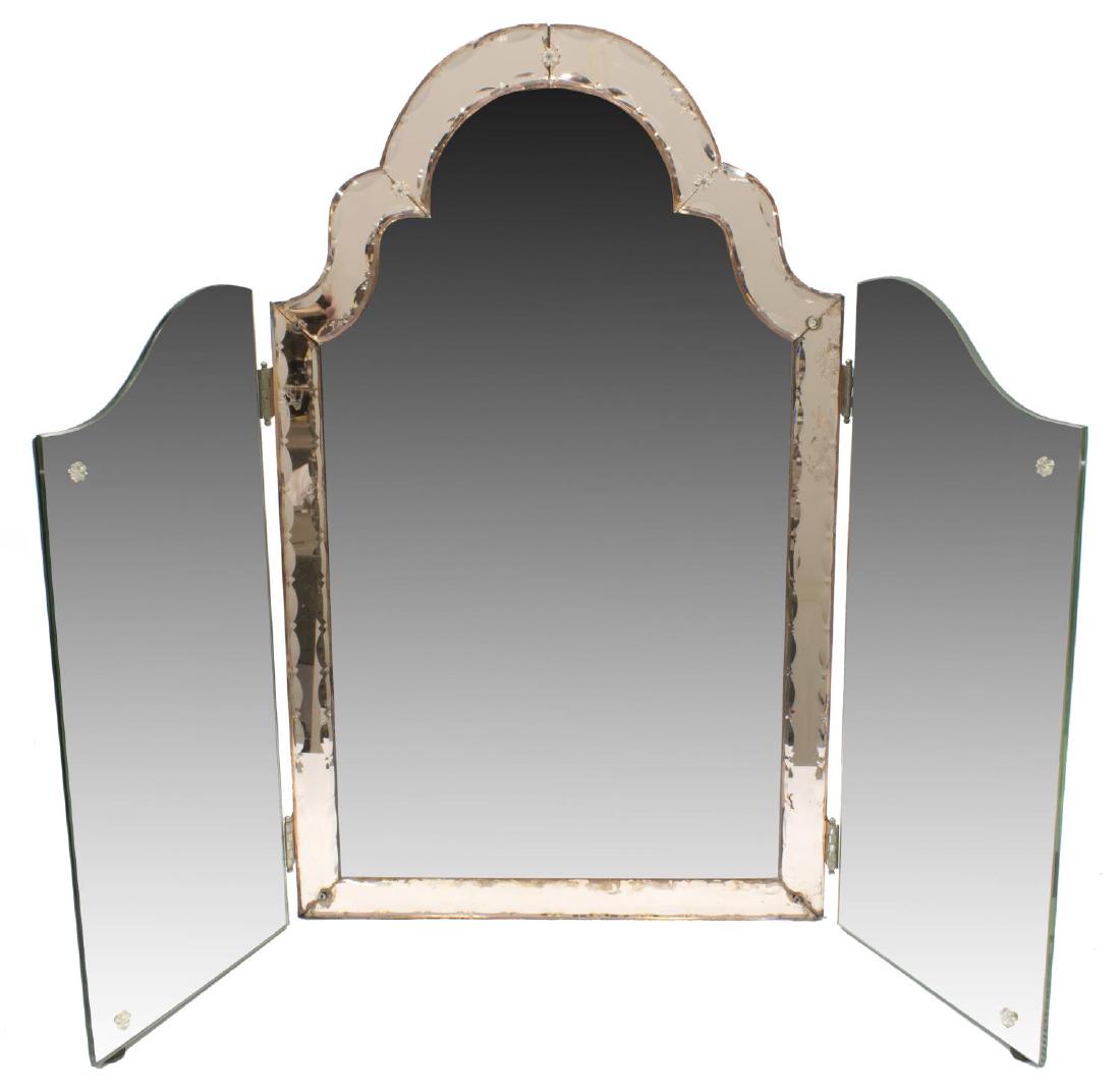 VENETIAN MURANO GLASS TRIPTYC VANITY TABLE MIRROR: Venetian Murano glass folding mirror, Italy, 20th c., having three shaped panels, center panel with pink glass trim, approx 26"h, 36.75"w (open, laying flat), 26lbs Start Price: $150.00