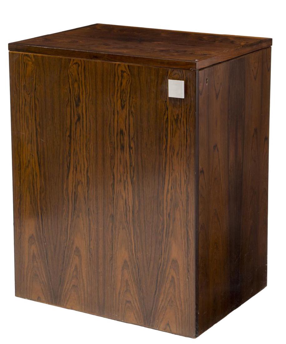 DANISH MID-CENTURY MODERN ROSEWOOD MOBILE BAR: Mid-century modern mobile bar, Denmark, c. 1960, having rosewood case, top and door open to reveal bar fittings, including an ice bucket, bottle rest, two drawers, over open shelves, back of door with