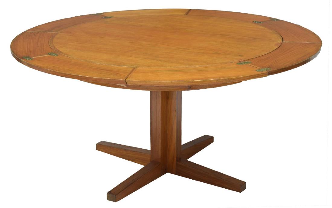 DANISH MID-CENTURY MODERN TEAK "LOTUS" TABLE: Dyrlund Danish mid-century modern teakwood "Lotus" or "Flip-Flap" table, late 1960's, a circular top, the circumference with four two part pull out and fold over leaves increasing the top diameter to
