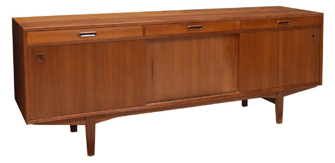DANISH MID-CENTURY MODERN TEAKWOOD SIDEBOARD: Danish mid-century modern teakwood sideboard, c. 1950s, having rectangular case, fitted with three frieze drawers, and sliding doors, opening to shelving, rising on tapered legs, approx 31"h, 78"w, 19