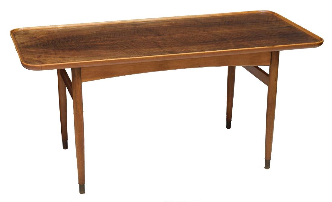 DANISH MID-CENTURY MODERN ROSEWOOD COFFEE TABLE: Danish mid-century modern coffee table, c. 1960s, having rectangular tray tabletop, with book matched rosewood veneer top, rising on teakwood frame with tapered legs, ending in metal cap feet, 24"h, 5