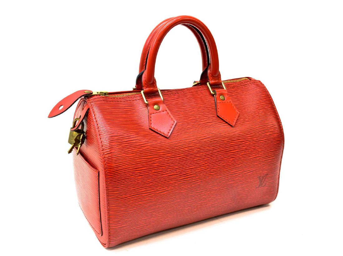 LOUIS VUITTON 'SPEEDY 25' RED EPI LEATHER HANDBAG: Louis Vuitton "Speedy 25" handbag in red Epi leather, gold tone hardware, having double rolled top handles, slot pocket to side, zip top opening hanging pocket and key ring, retaining lock and two key