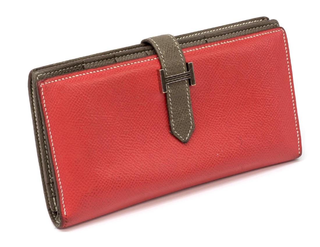 HERMES 'BEARN' PINK & BROWN LEATHER BI-FOLD WALLET: Hermes pink and brown leather bi-fold "Bearn" wallet, having gold tone hardware, slip leather tab opening to interior with a full length zippered pocket and a bill compartment on one side, five card s