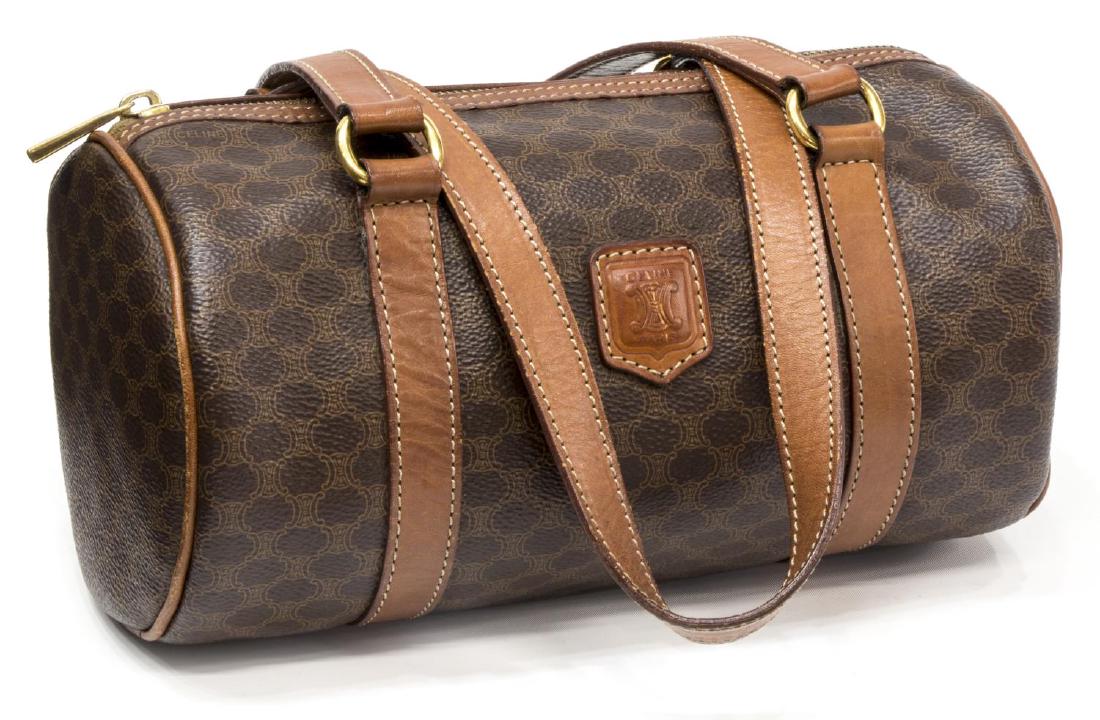 CELINE MACADAM CANVAS BROWN MONOGRAM BARREL BAG: Celine barrel bag/ shoulder bag in brown macadam coated monogrammed canvas, brown leather dual handles and trim, gold tone hardware, zippered top opening to light brown leather interior with single zi