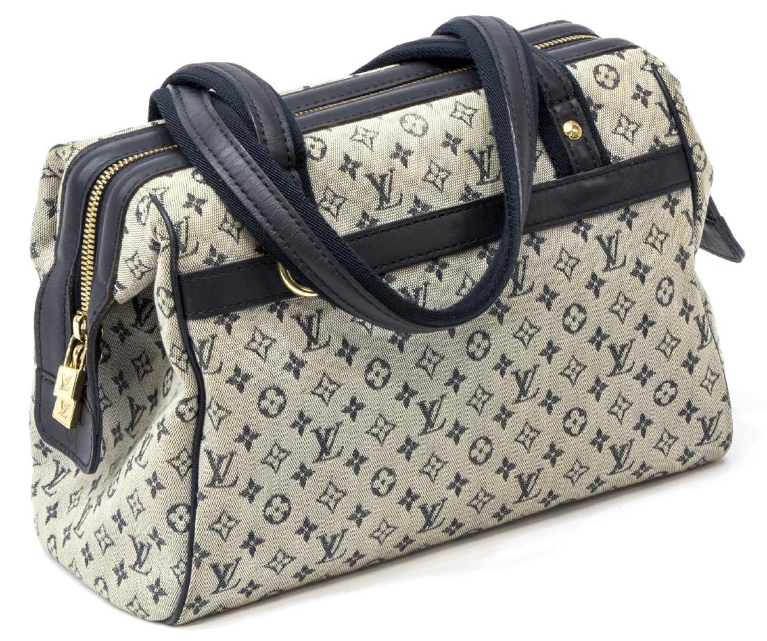 LOUIS VUITTON 'JOSEPHINE' NAVY IDYLLE HANDBAG: Louis Vuitton 'Josephine' blue monogram idylle canvas handbag, gold tone hardware, having navy canvas handles and leather trimmings, zipper top opening to zipper pocket and cell phone pocket, on gilt 