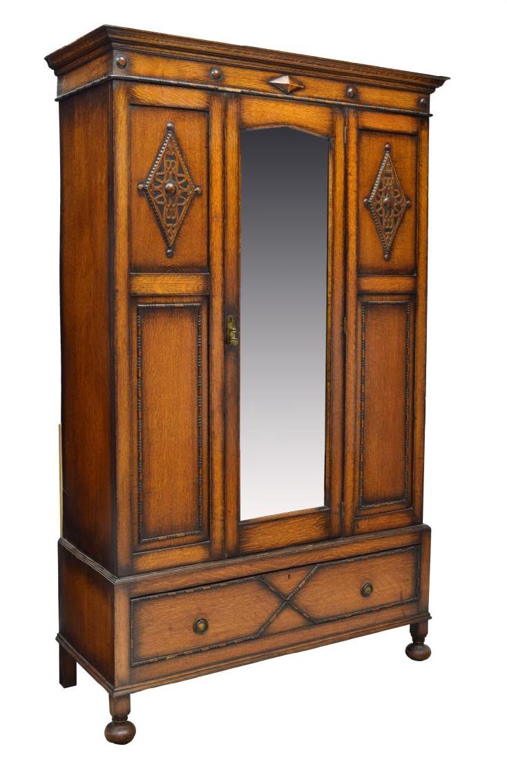 ENGLISH JACOBEAN STYLE CARVED OAK ARMOIRE, 1930S (1 of 2)