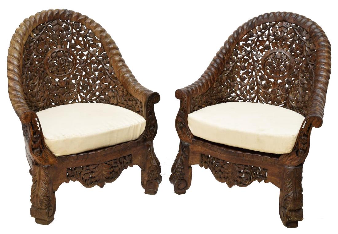 (PAIR) CARVED PIERCED ANGLO-INDIAN TEAK ARMCHAIRS (1 of 3)