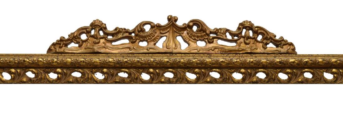 ITALIAN CARVED GILTWOOD CURTAIN VALENCE OR PELMET: Giltwood curtain valence or pelmet, Italy, 20th c., having carved and pierced rail, surmounted by scrolled foliate crown, retaining curtain track clips, some gilt loss, 8"h, 82.5"w, 14.25"d Start Pric