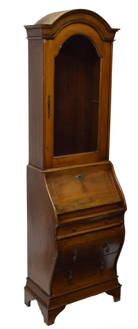 VINTAGE ITALIAN WALNUT GLAZED SECRETARY, 20TH C: Vintage Italian walnut secretary, 20th c., having a corniced arched top over the single glass panel door, opening to shelved interior, over a fall front door, concealing fitted four-drawer interior, o