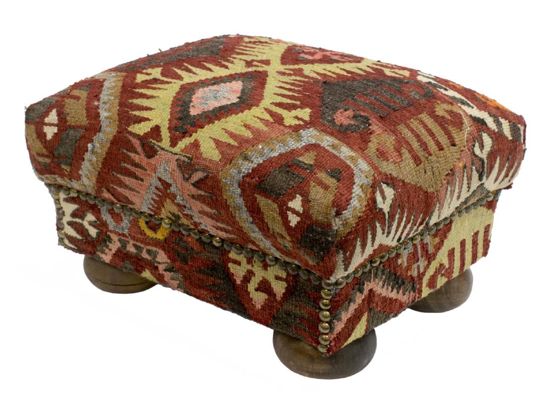 DIMINUTIVE KILIM COVERED FOOTSTOOL ON BUN FEET (1 of 2)