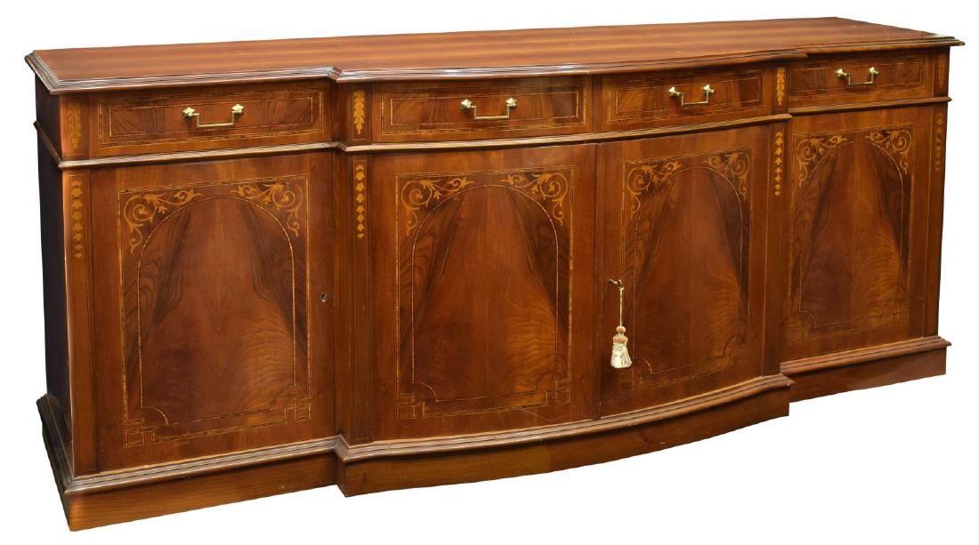 ENGLISH MAHOGANY FINISH MARQUETRY SIDEBOARD: English mahogany finish sideboard, 20th c., with brass hardware, having four drawers, two single cabinets, and one double door bow front cabinet, all with marquetry decoration, rising on stepped base,