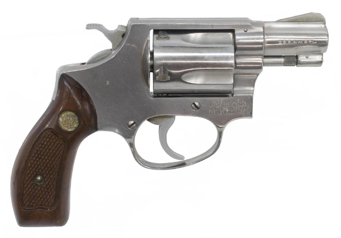 SMITH & WESSON MODEL 60 REVOLVER, .38 CALIBER: Smith & Wesson Model 60 Chief's Special revolver, .38 S&W Spl. caliber, five round cylinder, hand ejector rod, 1.7/8" barrel, double action, stainless steel, wood checkered grips, SN: R97XXX *REQUIRES