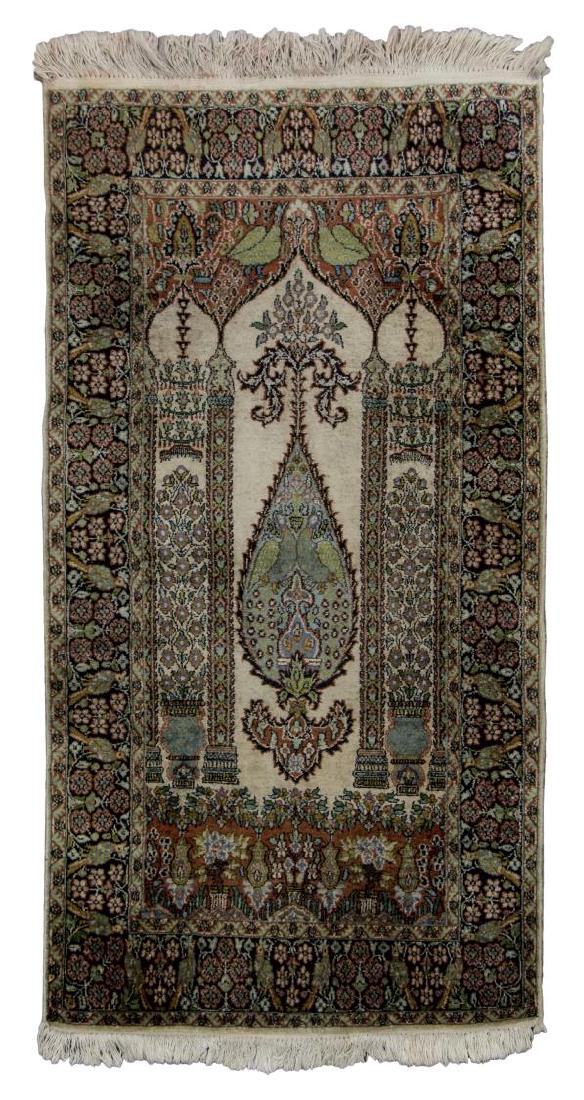 KASHMIRE SILK & COTTON RUN, 2'5" x 4'8": Kashmir hand-woven rug, silk pile, cotton foundation, with architectural motif and birds, some loss and staining to fringe, approx 2'5" x 4'8" **Provenance: The living estate of Coach George Hannon (K