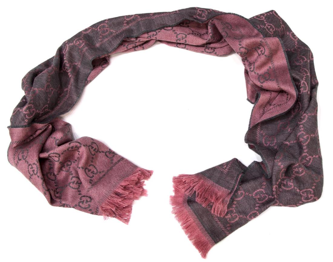 GUCCI GRAPHITE/PINK WOOL SCARF /WRAP, NEW W/ TAGS: Gucci graphite and pink 100% wool logo scarf / shawl, Made in Italy, new with $250 retail tags, 74"l, 19.25"w (inclusive of fringe), 1lb **Provenance: The living estate of Coach George Hannon (Kemp, T