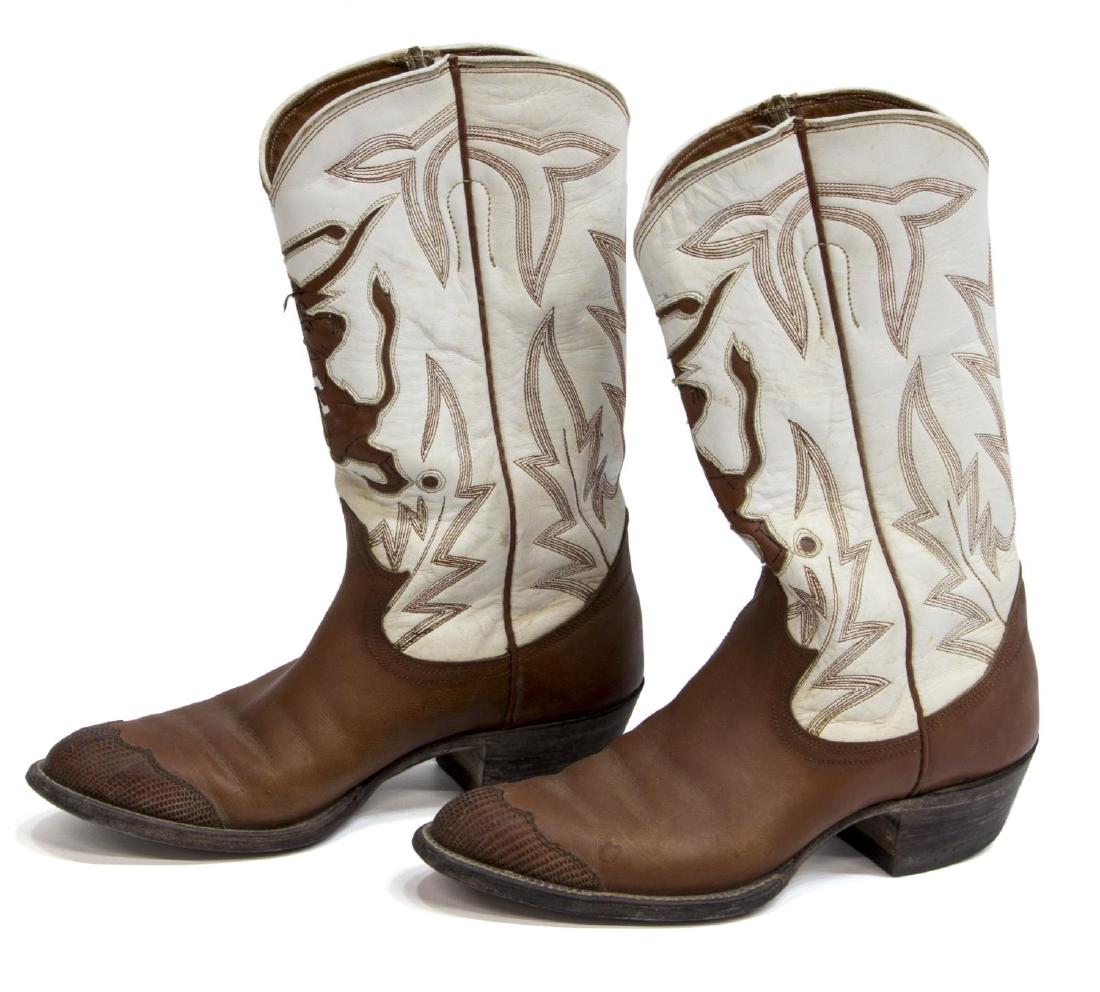WOMEN'S UNIVERSITY OF TEXAS LEATHER COWBOY BOOTS: (pair) Vintage custom women's leather and snakeskin cowboy boots, with University of Texas golf team logo, Bevo swinging a club, no size visible, approx 10.25"l, 3.5"w (exterior), 2.5lbs **Provenance: