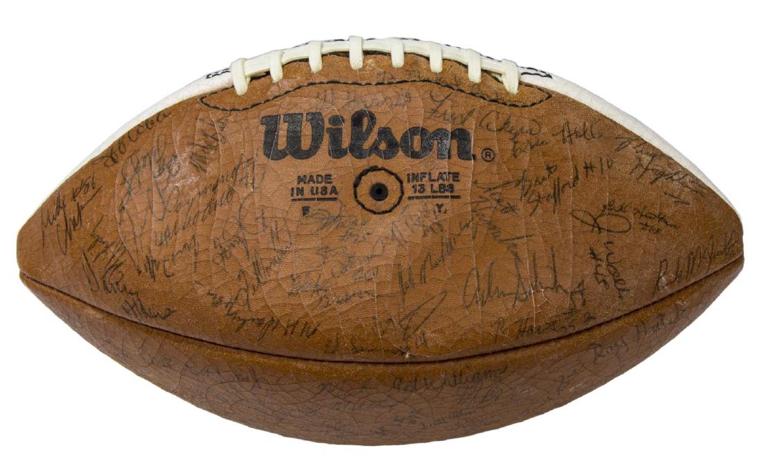 TEXAS LONGHORN AUTOGAPHED BALL, AKERS, TEAM: University of Texas autographed football, believed to be 1983 (11-0 season) ,including signatures of Fred Akers, Bret Stafford, about 80 autographs in total, some fading, includes original Wilson box: