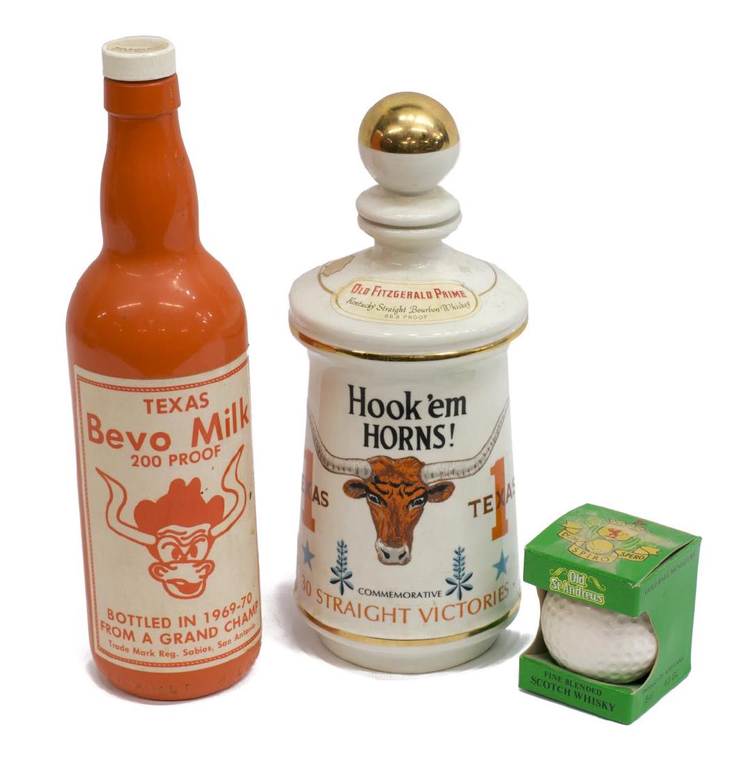 (3) UNIVERSITY OF TEXAS BAR ITEMS INCLUD BEVO MILK: (lot of 3) University of Texas themed bar items, including: (one) "Bevo Milk" bottle, from the 1969/1970 National Football Championship, 11.5"h, 3"diam; (one) Commemorative "Hook 'em Horns!" decanter,